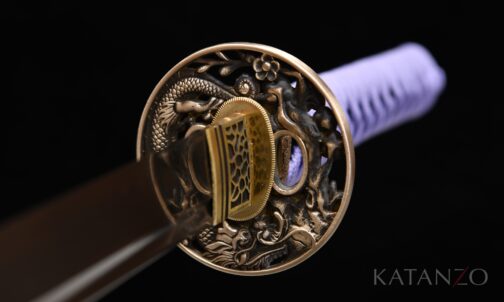 Messing-Tsuba des Murasaki Ryū Katana mit detailreichem Drachenmotiv