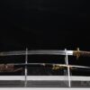schwarz lackierte Saya mit goldenem Blütenzweig am Samurai Schwert