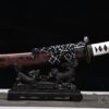Makiryū Tanto mit schwarz-roter gravierter Hartholz-Saya und weisser Griffwicklung