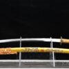 Ōgonryū Katana mit goldfarbener Hartholz-Saya und detailreichen Drachenmotiven