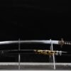 Ryūshō Katana mit schwarz lackierter Saya und goldfarbenem Drachen- und Wassermotiv